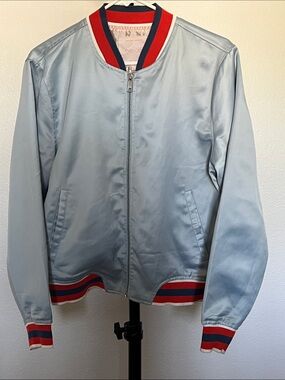ban.do “SOMEWHERE” Light Blue Satin Bomber Jacket with Red & Navy Trim